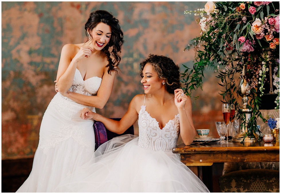 Two models wearing wedding gowns in wedding styled photography shoot in monastery in Cincinnati, ohio. 